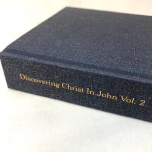 An image of a blue hardback book on a white background